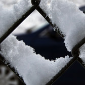 snow on fence